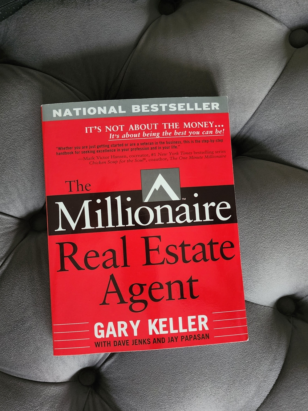 Red 'Millionaire Real Estate Agent' Book by Gary Keller